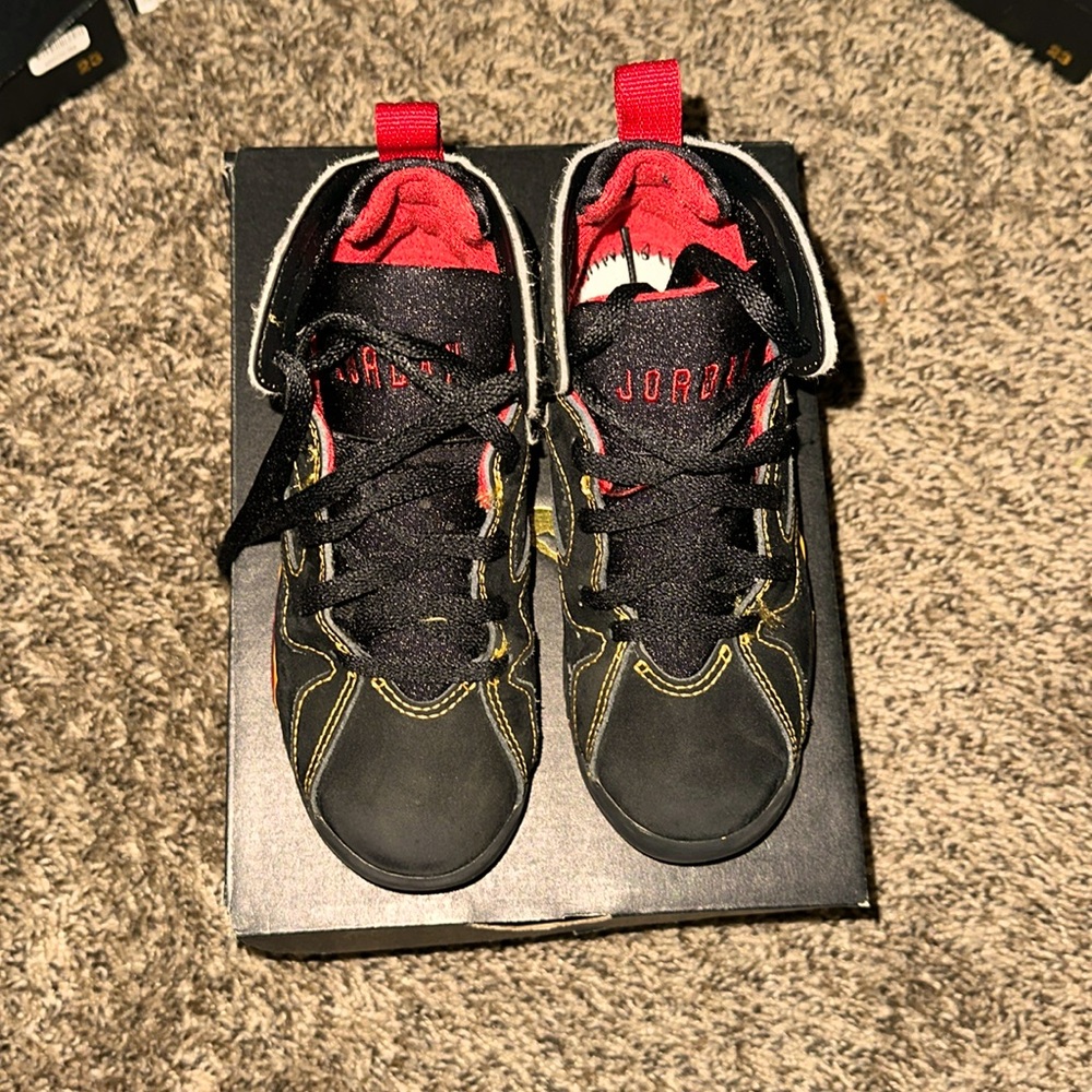 Jordan retro 7 preschool size 11.5 c black red and yellow